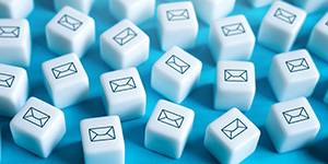 Email newsletter icon on white cubes